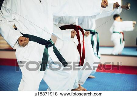 Stock Photo - Children in taekwondo class. Fotosearch