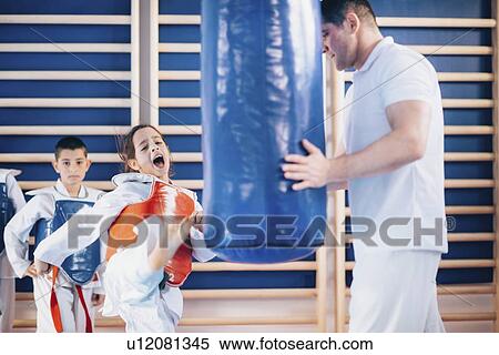 Children in taekwondo class View Large Photo Image Stock Photography - Children in taekwondo class. Fotosearch