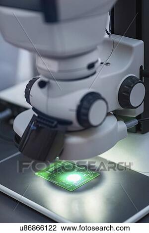 Stock Image - Circuit board production. Fotosearch