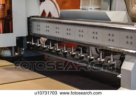 Stock Image - CNC woodworking machine. Fotosearch