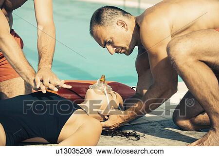 Stock Photo - CPR training for lifeguards. Fotosearch