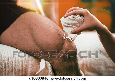 Cryo massage for knee pain View Large Photo Image Stock Photograph - Cryo massage for knee pain. Fotosearch