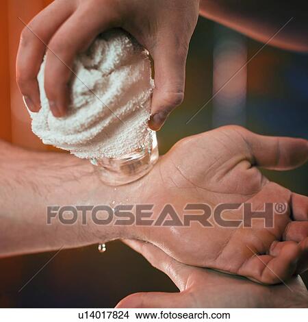 Picture - Cryo massage for wrist pain. Fotosearch