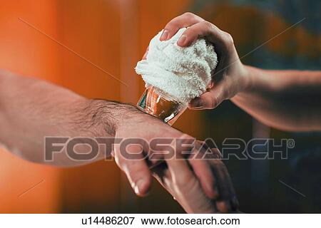 Cryo massage for wrist pain View Large Photo Image Stock Photo - Cryo massage for wrist pain. Fotosearch