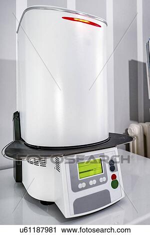 Stock Image - Dental press oven. Fotosearch