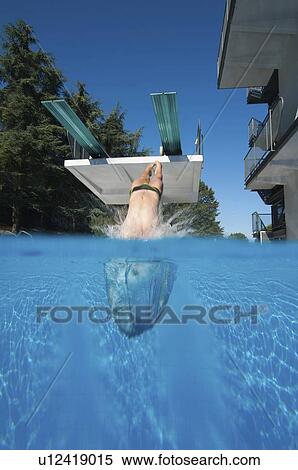Diver entering water View Large Photo Image Stock Photography - Diver entering water. Fotosearch