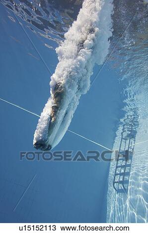 Stock Image - Diver underwater. Fotosearch