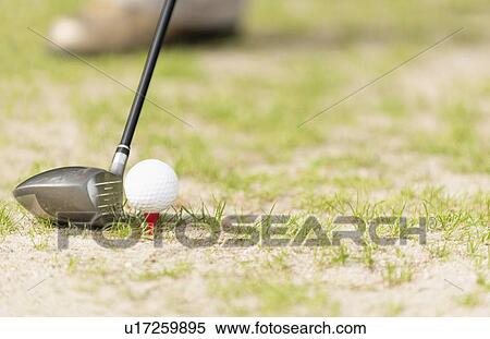 Stock Photography - Driver and ball on tee. Fotosearch