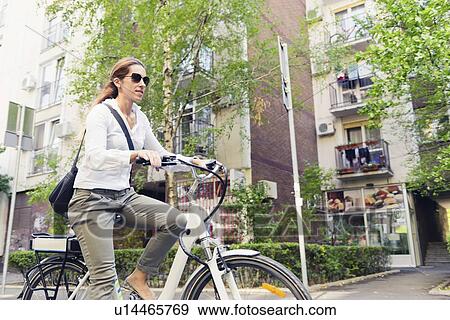 Stock Photo - E-bike commuter. Fotosearch