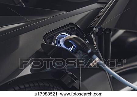 Electric car charging View Large Photo Image Stock Image - Electric car charging. Fotosearch