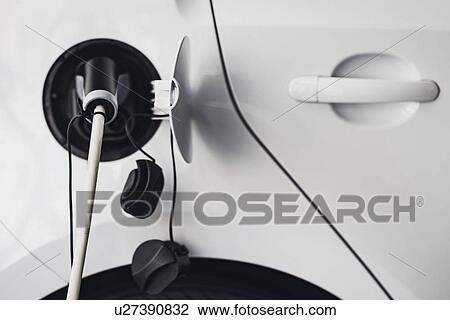 Electric car charging View Large Photo Image Stock Image - Electric car charging. Fotosearch