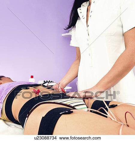 Electrical muscle stimulation View Large Photo Image Picture - Electrical muscle stimulation. Fotosearch