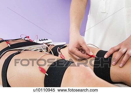 Electrical muscle stimulation View Large Photo Image Stock Photography - Electrical muscle stimulation. Fotosearch