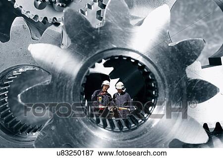 Stock Photo - Engineers and gears. Fotosearch