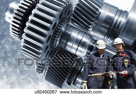Stock Photo - Engineers and gears. Fotosearch