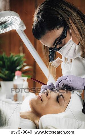 Stock Image - Eyebrow microblading. Fotosearch