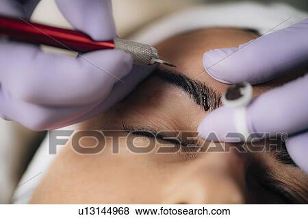 Eyebrow microblading View Large Photo Image Stock Photo - Eyebrow microblading. Fotosearch