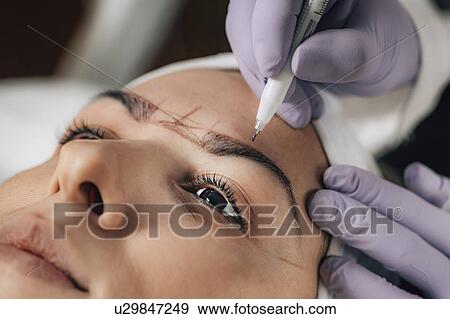 Eyebrow microblading View Large Photo Image Stock Photo - Eyebrow microblading. Fotosearch
