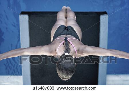 Female diver on platform View Large Photo Image Stock Image - Female diver on platform. Fotosearch