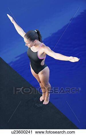Female diver on platform View Large Photo Image Stock Image - Female diver on platform. Fotosearch