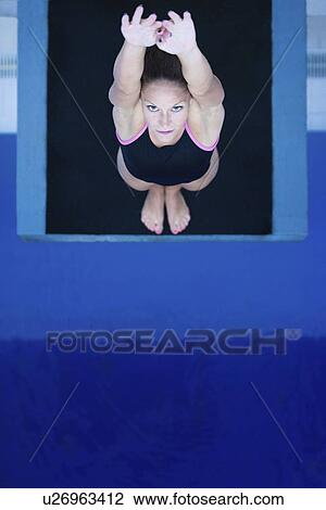 Female diver on platform View Large Photo Image Stock Image - Female diver on platform. Fotosearch
