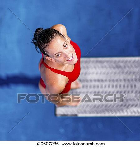 Stock Photograph - Female diver on springboard. Fotosearch