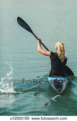 Stock Image - Female kayaker. Fotosearch