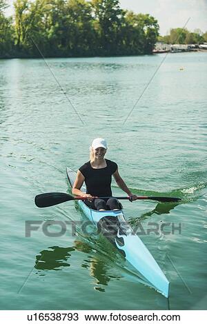 Stock Image - Female kayaker. Fotosearch