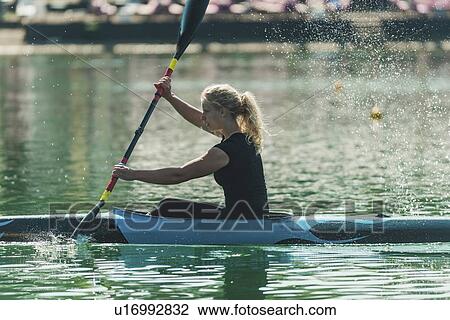 Female kayaker View Large Photo Image Stock Image - Female kayaker. Fotosearch