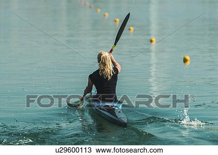 Stock Image - Female kayaker. Fotosearch