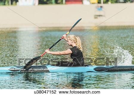 Stock Image - Female kayaker. Fotosearch