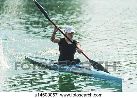 Stock Photo - Female kayaker. Fotosearch