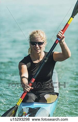 Stock Photo - Female kayaker. Fotosearch