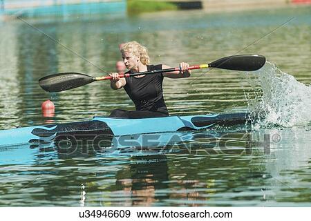 Stock Photo - Female kayaker. Fotosearch