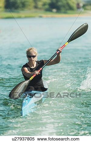 Stock Photography - Female kayaker. Fotosearch