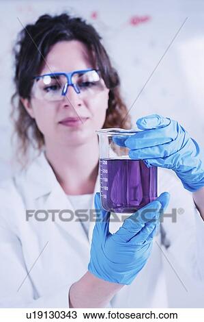 Stock Image - Female researcher in laboratory. Fotosearch