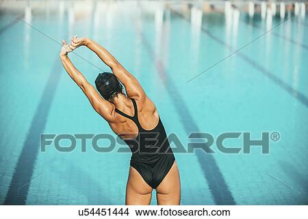Picture - Female swimmer warming up. Fotosearch