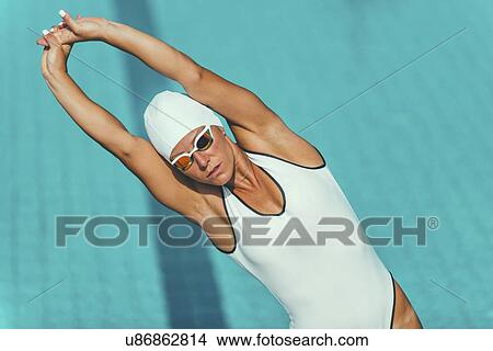 Picture - Female swimmer warming up. Fotosearch