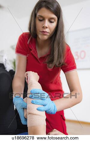Stock Photo - First aid training for burns. Fotosearch