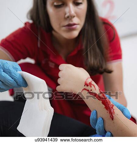 Stock Photo - First aid training for burns. Fotosearch