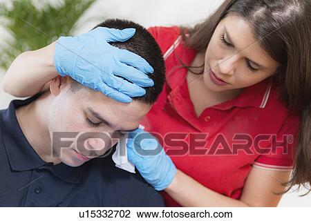Stock Image - Food poisoning first aid training. Fotosearch
