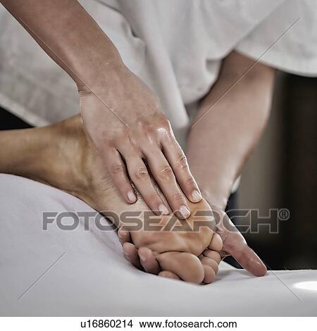 Picture - Foot massage. Fotosearch