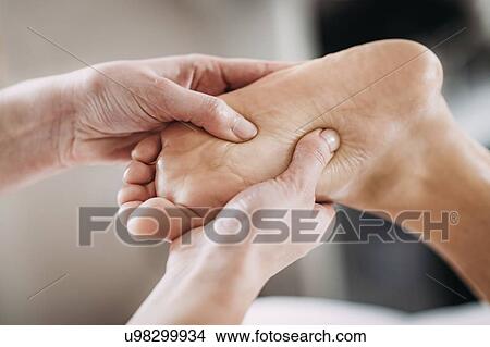 Picture - Foot massage. Fotosearch