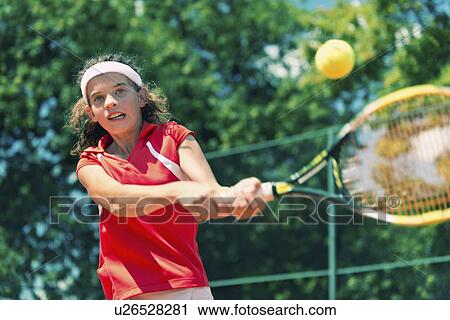 Girl playing tennis View Large Photo Image Stock Image - Girl playing tennis. Fotosearch