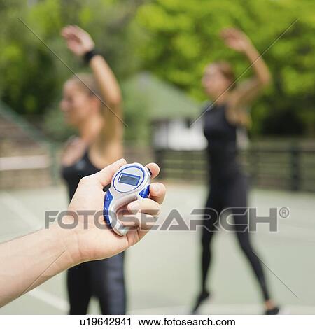 Group exercise class outdoors View Large Photo Image Stock Image - Group exercise class outdoors. Fotosearch