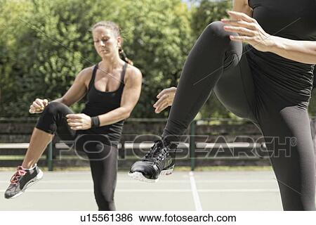 Group exercise class outdoors View Large Photo Image Stock Photograph - Group exercise class outdoors. Fotosearch