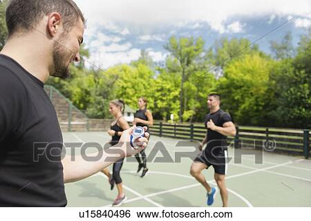 Group exercise class outdoors View Large Photo Image Stock Photograph - Group exercise class outdoors. Fotosearch