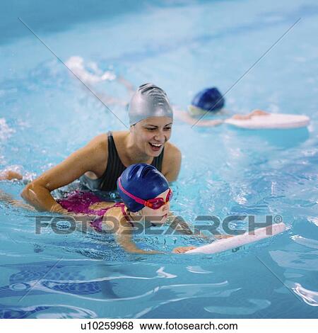 Group swimming lesson View Large Photo Image Stock Photo - Group swimming lesson. Fotosearch