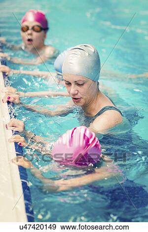 Group swimming lesson View Large Photo Image Stock Photo - Group swimming lesson. Fotosearch