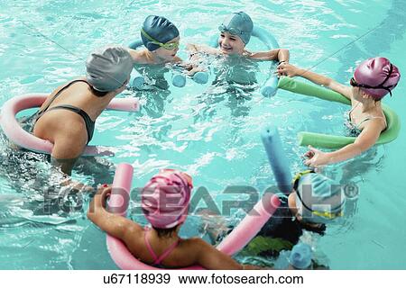 Stock Photo - Group swimming lesson. Fotosearch